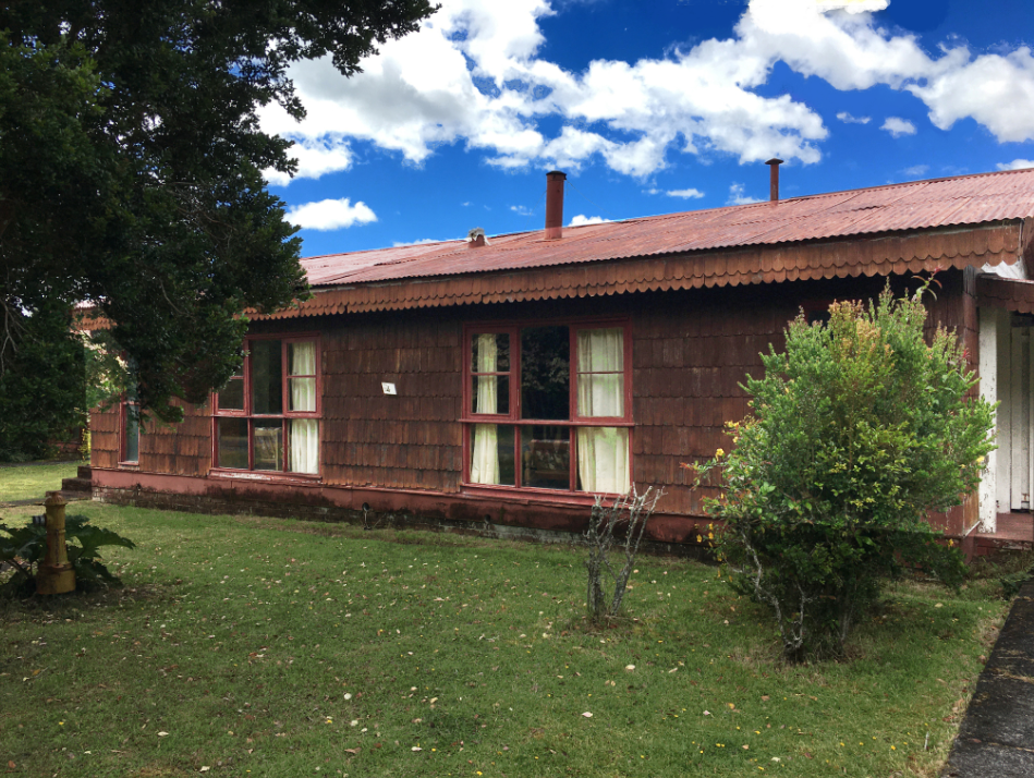 16- CABIN GRASS AND BLUE SKY